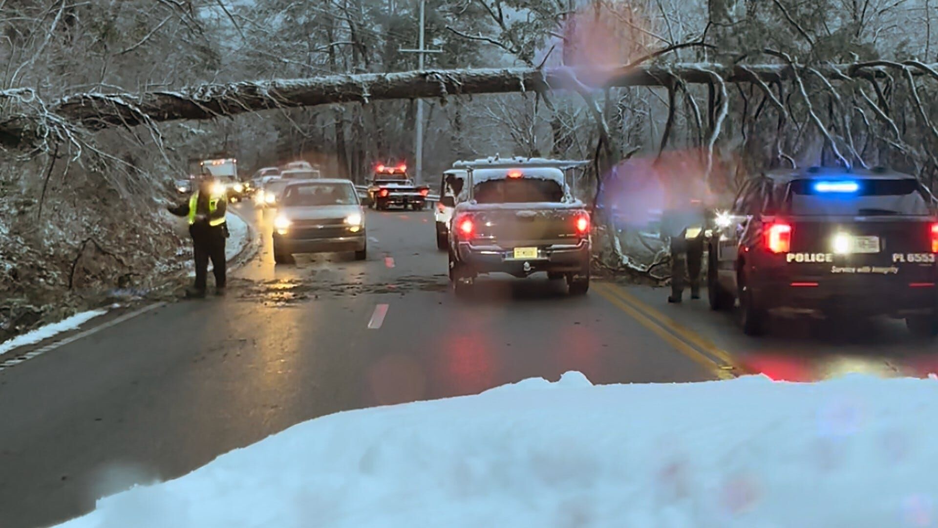 Traffic Alert: Snow weather impacting roadways, several trees down